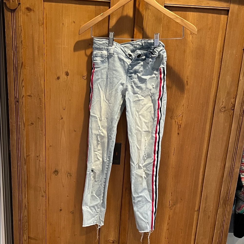 Light Blue ripped jeggings with Red and Black Stripes by Cat and Jack size 10